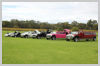 Fleet shot of Hummer Limo Hire Service in Perth. Red Hummer Limo, Hot Pink Hummer Limo, Jet BLack Hummer Limo. Wedding Limousines Perth